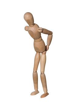 wooden mannequin stands bent over and holds on to the ass, isolated on white background