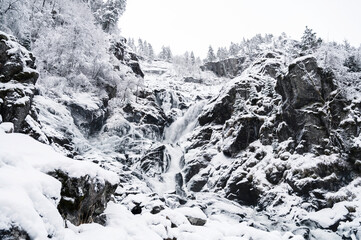 Fototapeta na wymiar Latefossen Waterfall details during cold winter in Odda, Norway