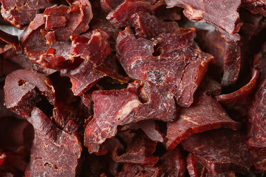Spicy beef jerky as background
