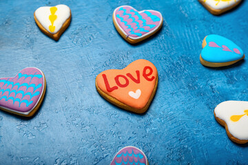 Valentine's Day heart shaped cookies on color background