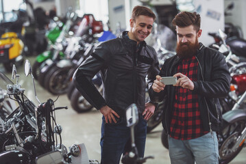 Men in motorbike salon