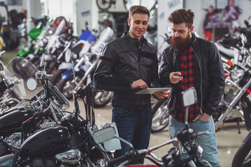 Men in motorbike salon