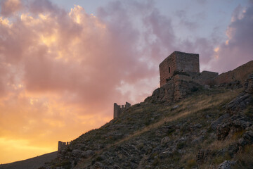 Obraz premium Beautiful scene of a colorful sky on high cliffs in Albarracin, Teruel province, Spain