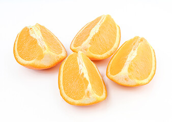 Fresh orange slices isolated on white background. Fruit quarters