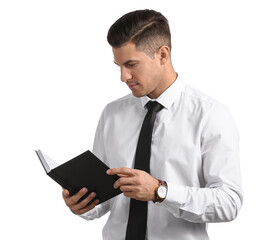 Handsome man in formal clothes reading book on white background