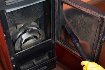 Clean the pellet stove with a vacuum cleaner, which is necessary for stove maintenance