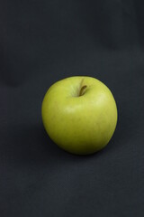 green apple on black