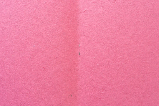 open scrapbook paper background (top down view) with blank space (focus on staples at centre)