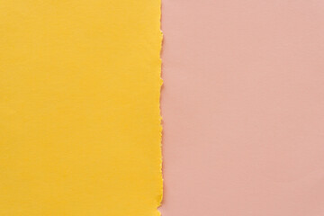 yellow and pink paper background (top down view) with blank space