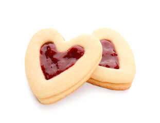 Tasty cookies in heart shape on white background