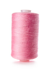Pink sewing thread spool on white background