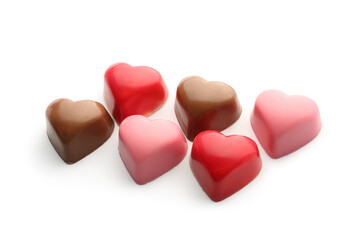 Delicious chocolate candies in shape of hearts isolated on white background