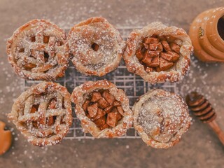 mini apple pies and honey © Tatiana