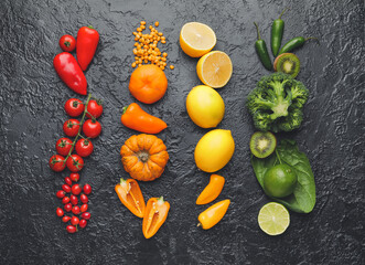 Different healthy products on dark background