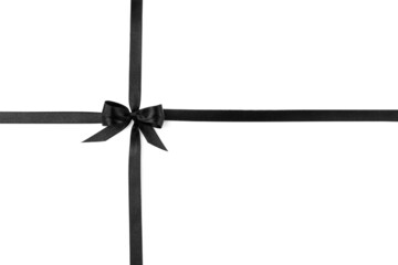 Elegant black ribbon with bow isolated on white, top view