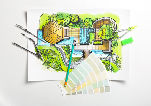 Plan of landscape designer with stationery and paint palettes on white background