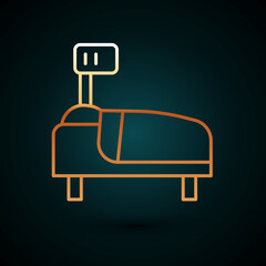 Gold line Hospital bed icon isolated on dark blue background. Vector