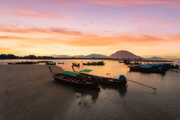Fototapeta na wymiar Sunrise from a longtail boat off the coast of Ranong Province, Thailand.