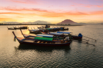 Fototapeta premium Sunrise from a longtail boat off the coast of Ranong Province, Thailand.