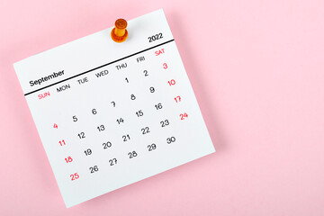 Calendar desk 2022 in September, The concept of planning and deadline with a push pin on the...