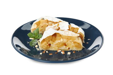 Delicious apple strudel with almonds, powdered sugar and mint on white background