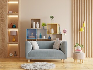 Interior design of living room with sofa on empty light cream color wall.