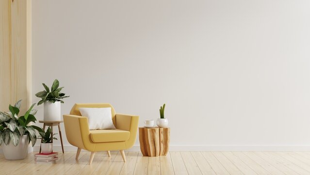 Modern minimalist interior with yellow armchair on empty white wall.
