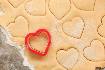 Dough for preparing cookies and molds on table. Valentines Day celebration