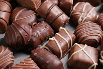 dark chocolate on a plate on table close up 