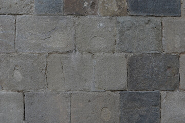 Closeup texture of beautifully made stone wall from 20th century