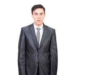 Shocked man in formal suit gazing with eyes wide open