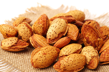  almonds nuts on white background.