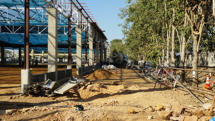 Fototapeta na wymiar Construction of a road beside the factory area