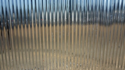 Galvanized fence blocking the temporary office