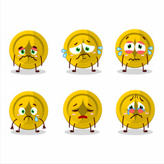 Gold coin cartoon character with sad expression
