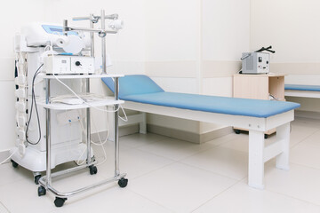 Hospital diagnostic room. Modern medical equipment, preventional medicine and healthcare concept. Modern hospital laboratory. Treatment room. Physiotherapy. Doctor office interior.