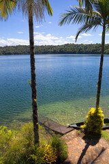 Waterlogged canoe and jetty at Lake Barrine on the Atherton Tableland in Queensland, Australia