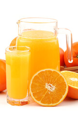 Fototapeta na wymiar orange juice and oranges