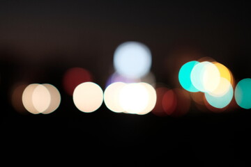 blurred traffic lights background at midnight ,Blurred Defocused Lights of Heavy Traffic in Wet Rain