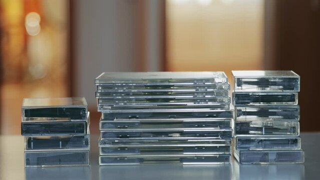 A shot of stacks of audio discs and cassettes