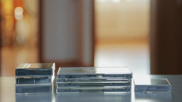 A shot of stacks of audio discs and cassettes