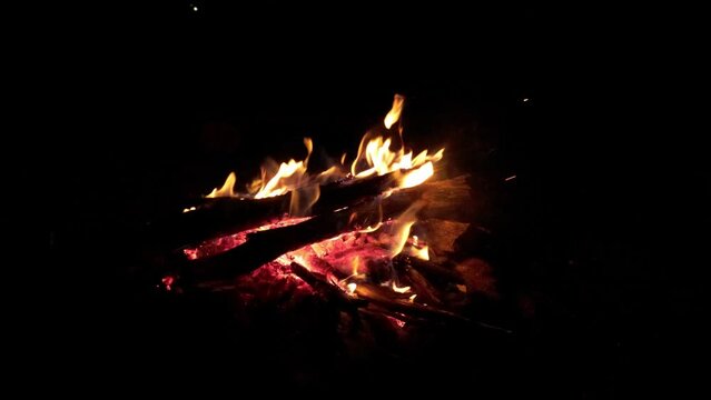 Campfire crackling at night