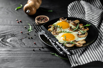 Fototapeta na wymiar Keto, paleo breakfast scrambeld eggs with mushrooms, banner, catering menu recipe place for text, top view