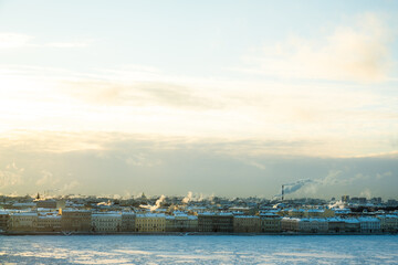 St. Petersburg, Russia - December, 2021: View of frozen Neva River and city center in sunny day.