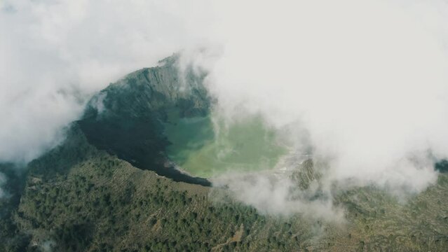 Volcanic Crater El Chichonal In Chiapas, Mexico On A Cloudy Day - aerial drone shot