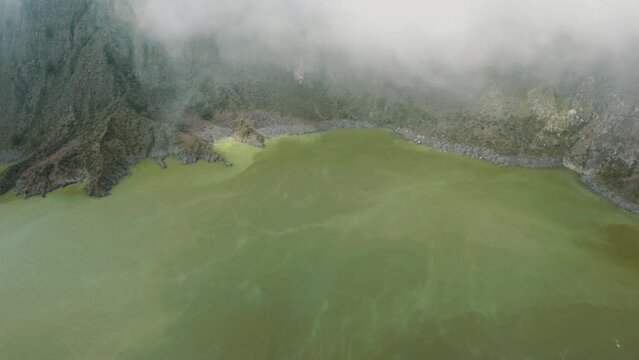 Sulfuric Green Lake In El Chichonal Volcano In Chiapas, Mexico - aerial drone shot