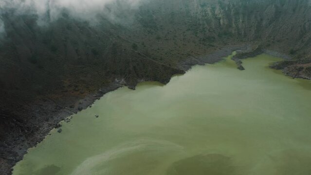 Vapor Gas Vents And Green Lake In Volcanic Crater El Chichonal in Chiapas, Mexico - aerial drone shot