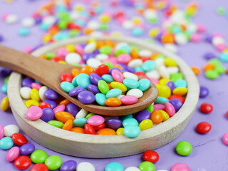 Fototapeta na wymiar Colorful sweet candy. rainbow candy sprinkles.
