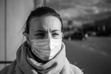 A picture of a girl in a mask. isolated Covid-19 pandemic.