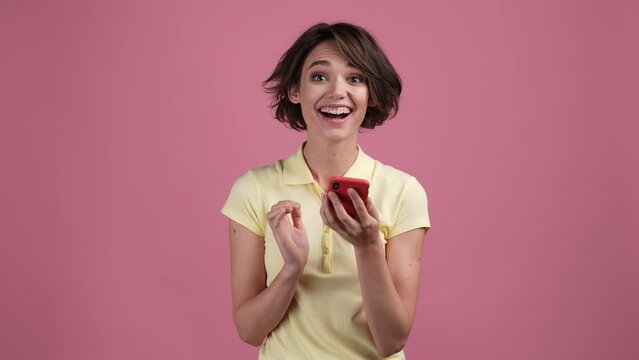 Lady blogger use devide fist up win followers isolated pastel color background